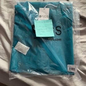 Brand new figs top still in bag size large